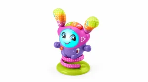 Brinquedo infantil em formato de um ursinho azul sorridente com chifres e acessórios coloridos na cabeça, usando roupa roxa e verde, em fundo branco.